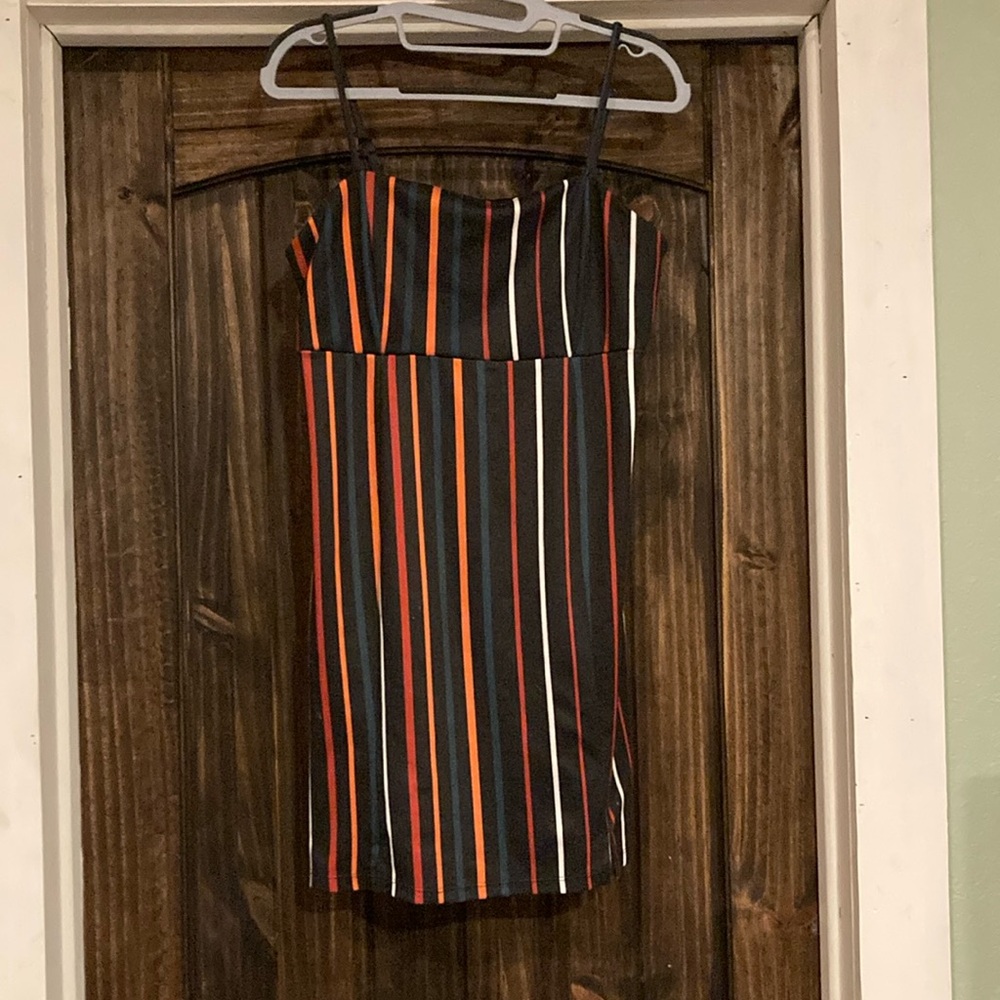 Size Small women’s black striped body con dress
